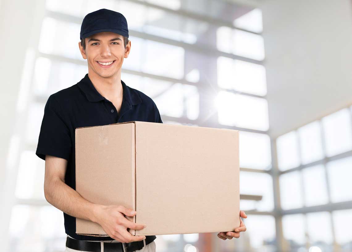 Delivery man with box | Bearcat Express Same-Day Courier Delivery Augusta GA, Athens GA and Atlanta GA